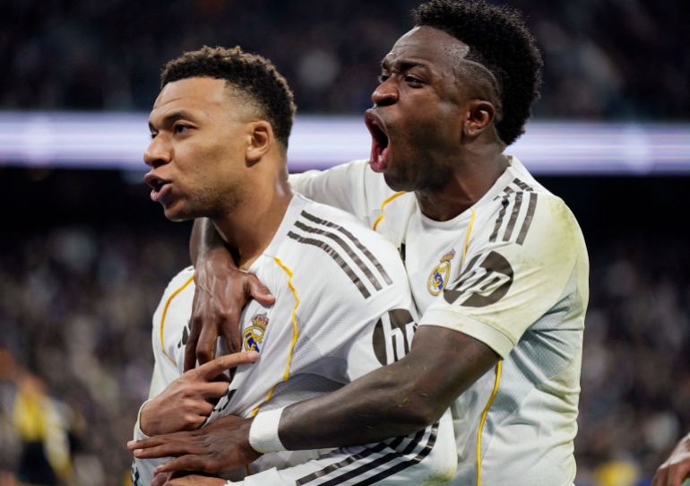 Kylian Mbappe and Vinicius Junior react.