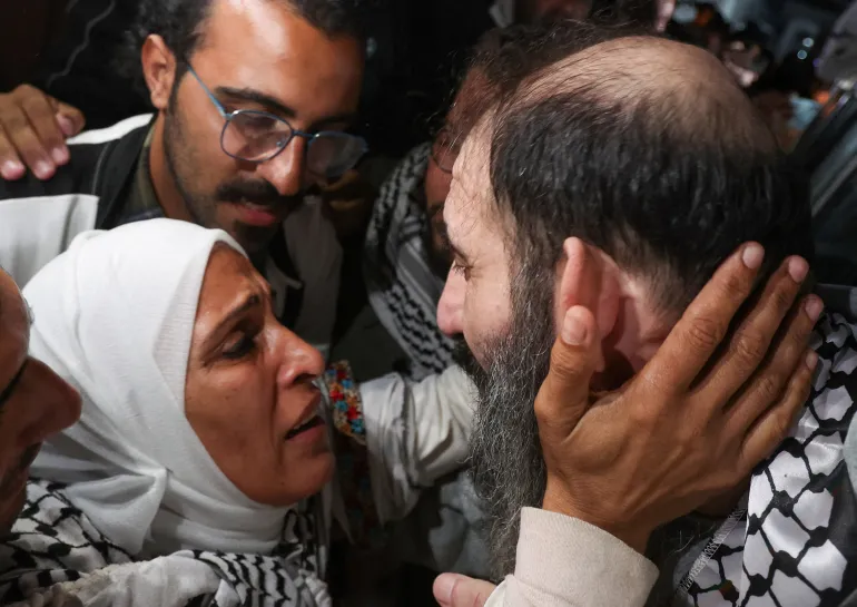 A freed Palestinian prisoner is welcomed after being released from an Israeli prison as part of a hostage-prisoner swap and a cease-fire deal in Gaza between Hamas and Israel, in Khan Younis in the southern Gaza Strip, January 30, 2025. REUTERS/Ramadan Abed TPX IMAGES FROM