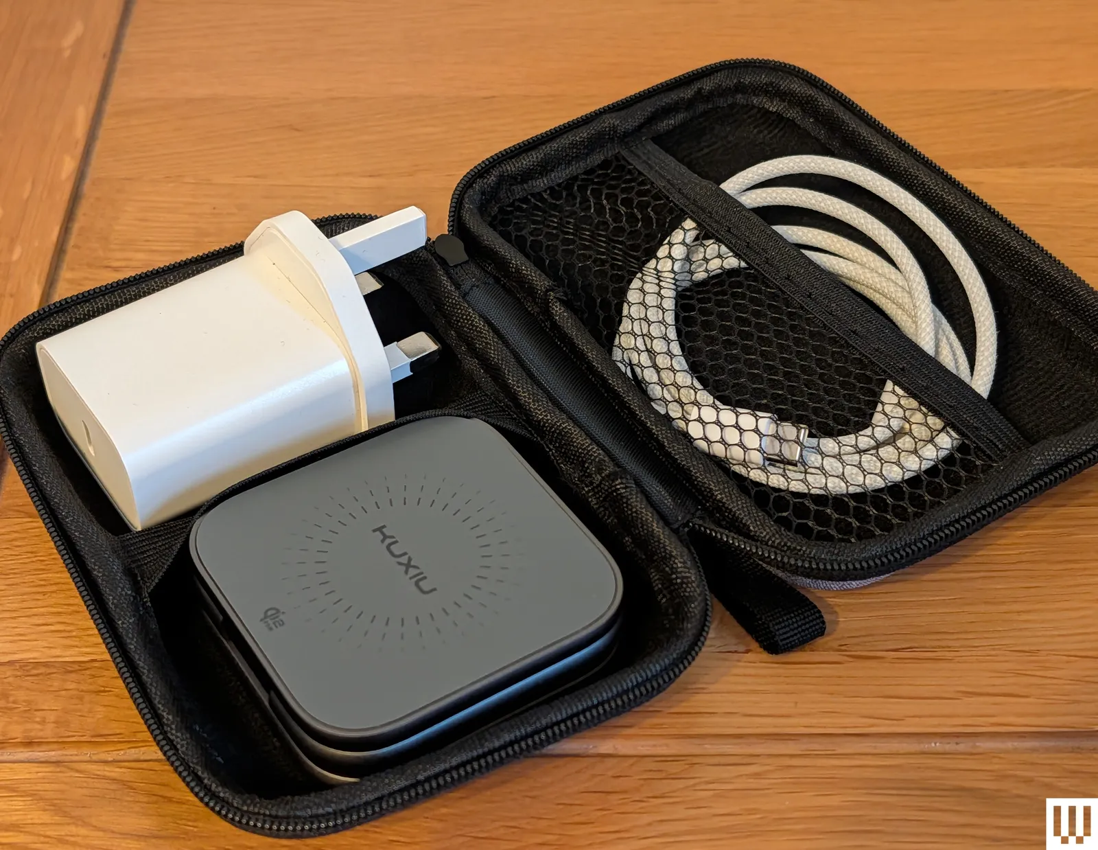 Image may contain Electronics Mobile Phone Hardware Accessories Bag and Handbag