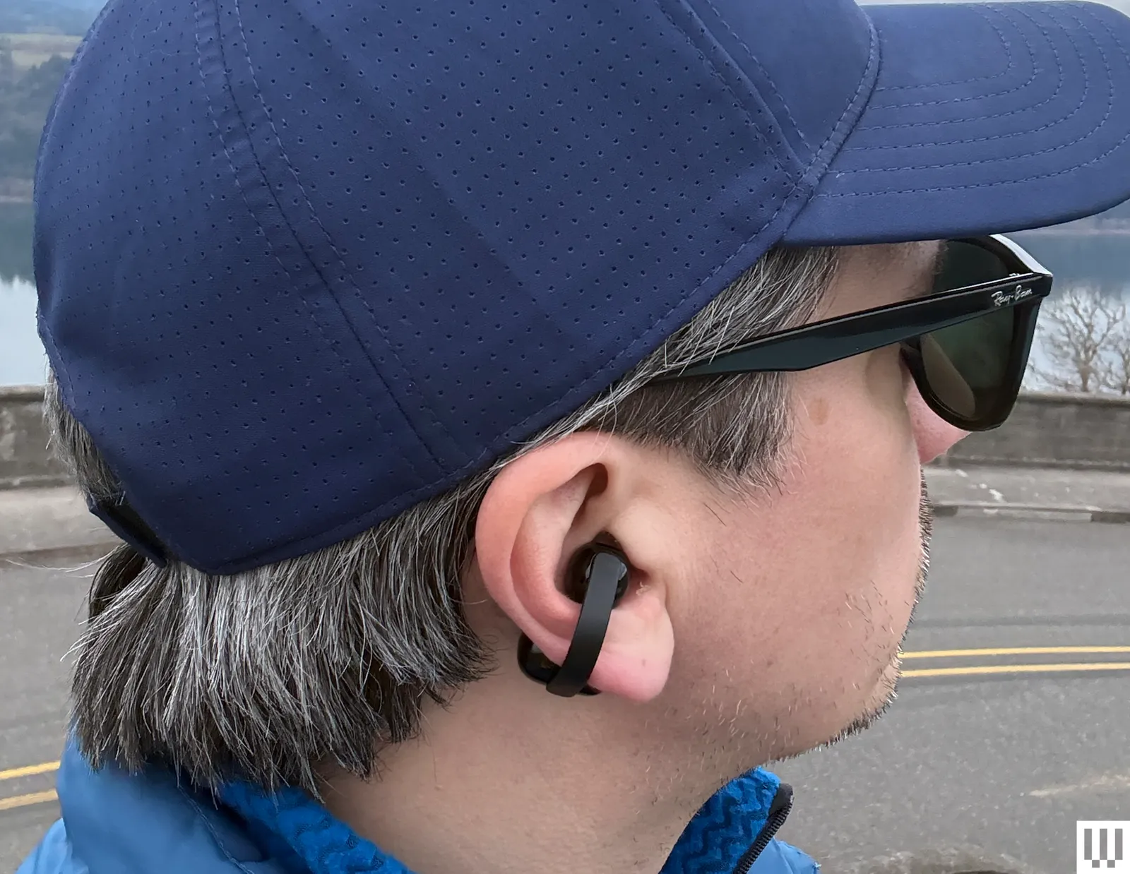 Image may contain: Baseball Cap Cap Clothing Hat Adult Person Body Part Ears Face and Head