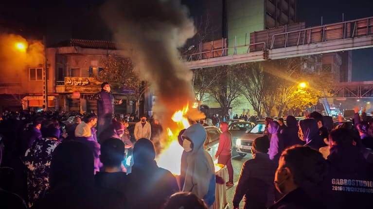 Fires are lit as protesters rally on January 8, 2026 in Tehran, Iran.