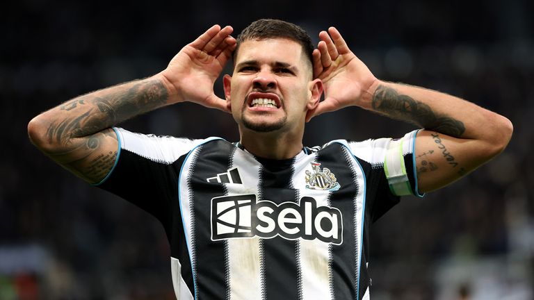 Bruno Guimaraes cups his ears in celebration after giving Newcastle the lead