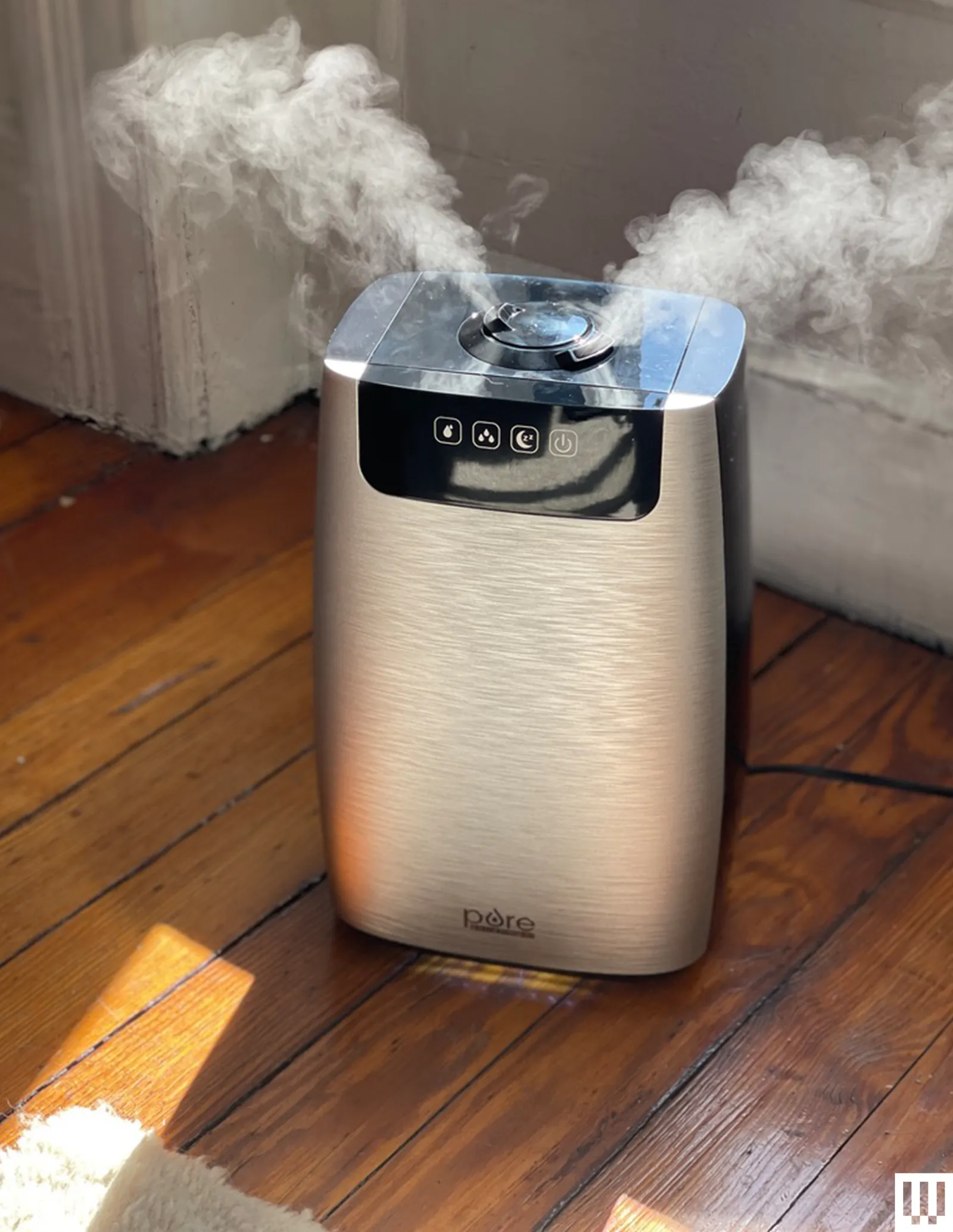 Pure Enrichment Hume XL Humidifier a silver rectangular device with mist coming out of the top