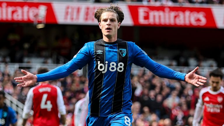 Alex Scott drives away to celebrate his game-winning goal