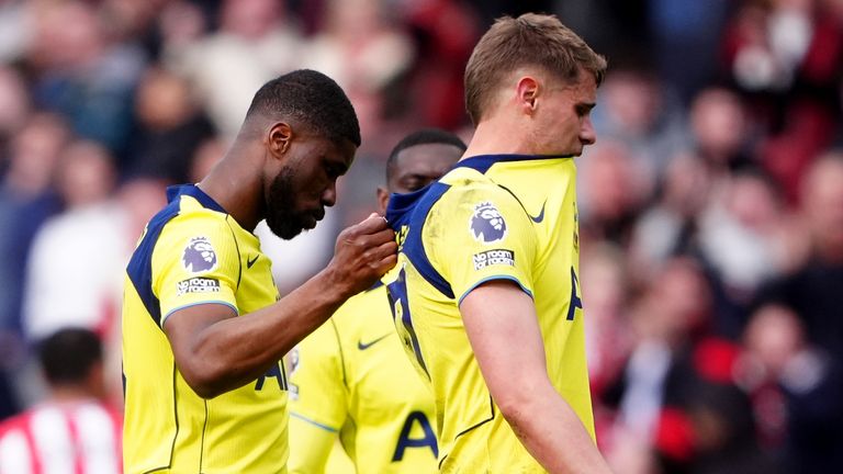 Tottenham Hotspur's Kevin Danso (left) and Micky van de Ven leave the field after defeat against Sunderland