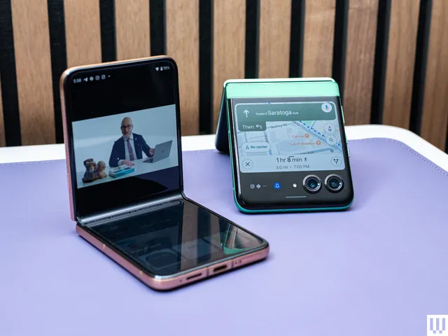 Image may contain: electronics, phone, cell phone, accessories, formal wear, tie, adult, person, computer, laptop and computer