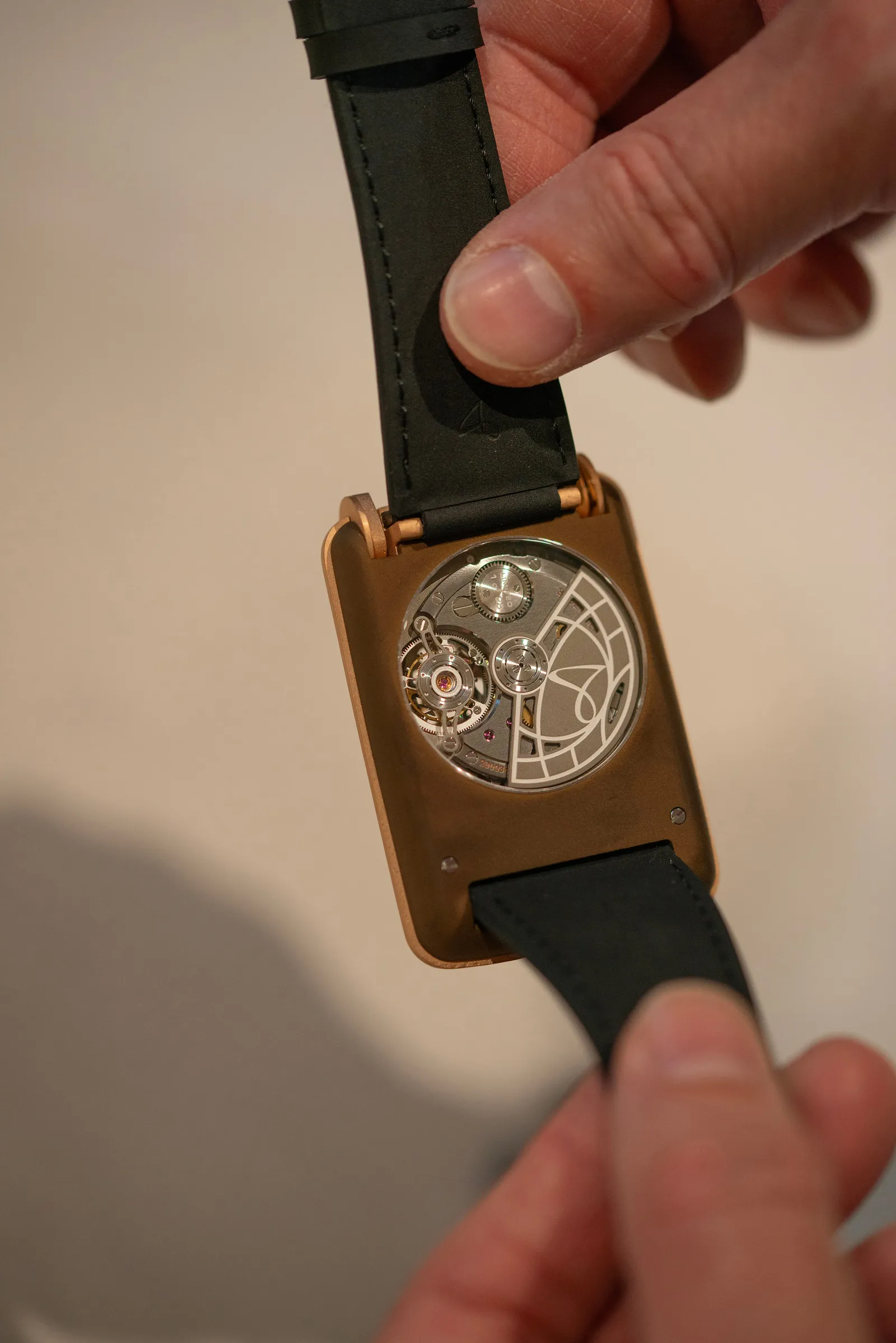 The back of Hautlence's new watch with a clear window to see internal watch hardware