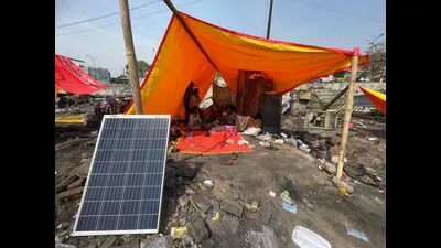A solar panel, donated by a good Samaritan, used to run a fan in a tent. (HT Photo)