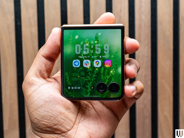 Image may contain: electronics, mobile phone, phone, baby, person and computer